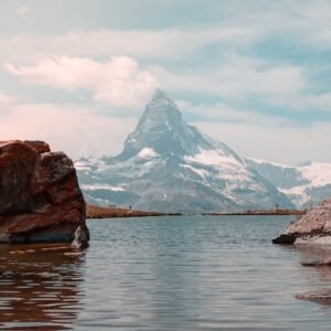 Snow Mountains - Tranquil view of the iconic Matterhorn peak refl #11917567