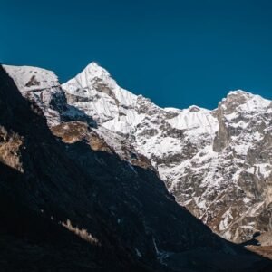 Mountain Landscapes - Captivating view of snow-covered mountain peaks  #12495915