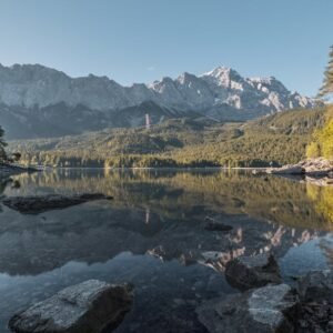 Snow Mountains - Scenic view of Zugspitze and Eibsee with reflect #12568084