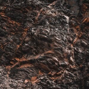 Desert Wilderness - Close-up of jagged, textured natural rock format #12918473