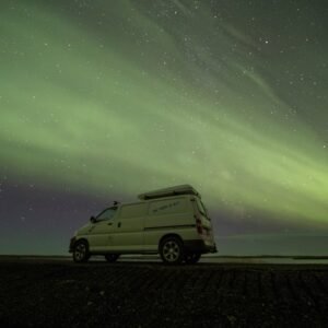 Mountain Landscapes - A camper van under the stunning aurora borealis  #17237090