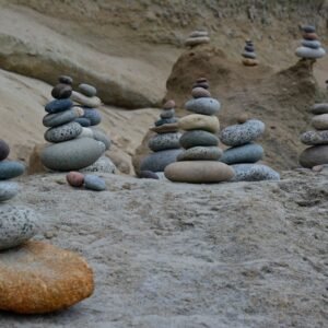Beach Scenery - Tranquil scene of balanced stone stacks on a roc #26752990