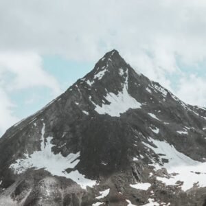 Snow Mountains - Stunning view of a rugged, snow-dotted mountain #27240701