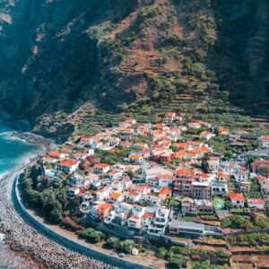 Mountain Landscapes - Stunning aerial view of a coastal town in Madeir #27429864