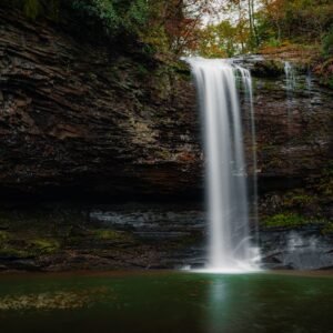 Forest Nature - A tranquil waterfall cascading over rugged cliff #28708793