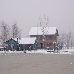 Lake Reflections - A serene winter scene of snow-covered homes by a #30093606