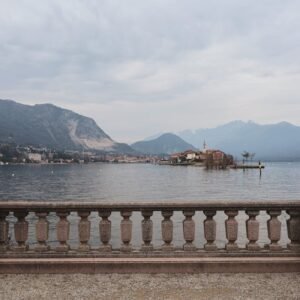 Lake Reflections - A tranquil winter panorama of Isola dei Pescator #31344810