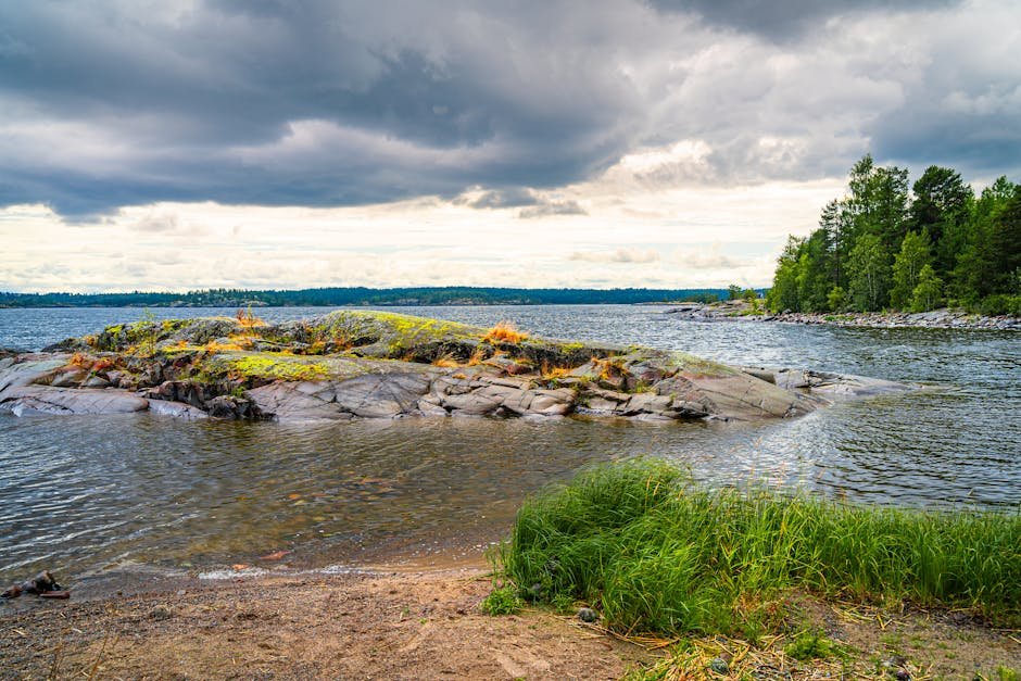 lake reflections beautiful view of a stone island and lush greene #33498332 Lake Reflections - Beautiful view of a stone island and lush greene #33498332