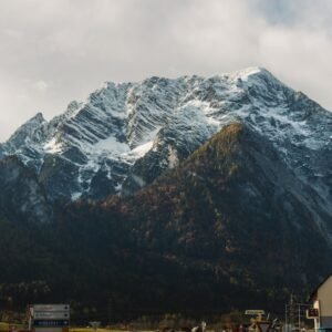 Mountain Landscapes - A breathtaking view of a snowy mountain peak in  #34506323