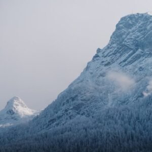 Mountain Landscapes - Serene view of a snow-covered mountain peak and  #35002218