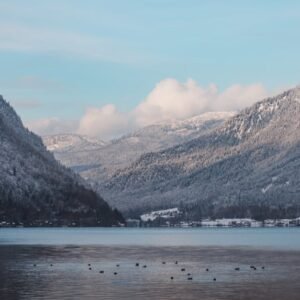 Lake Reflections - Serene winter landscape of a snow-covered mounta #35224233