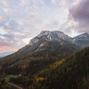 Mountain Landscapes - A breathtaking view of a mountain peak surrounde #35674498