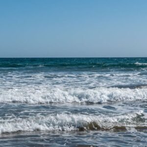 Beach Scenery - A tranquil ocean scene with gentle waves and a c #4050715